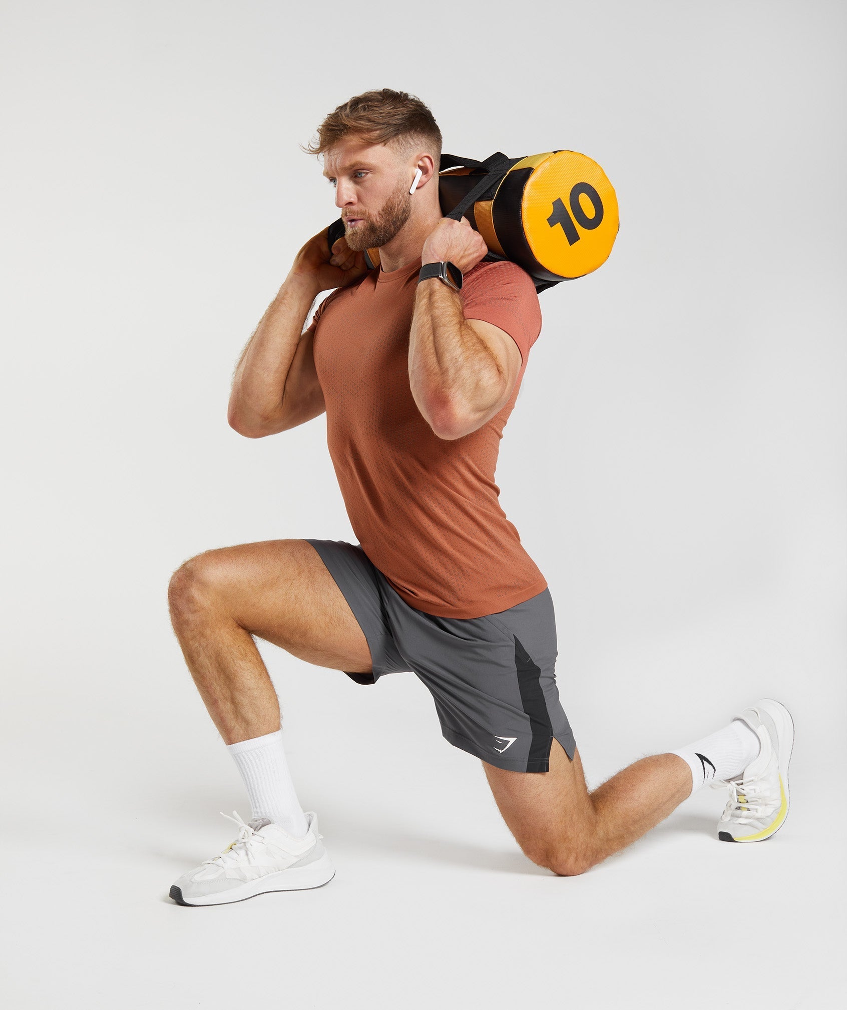 gymshark-sport-seamless-t-shirt-persimmon-red-warm-brown-ss23