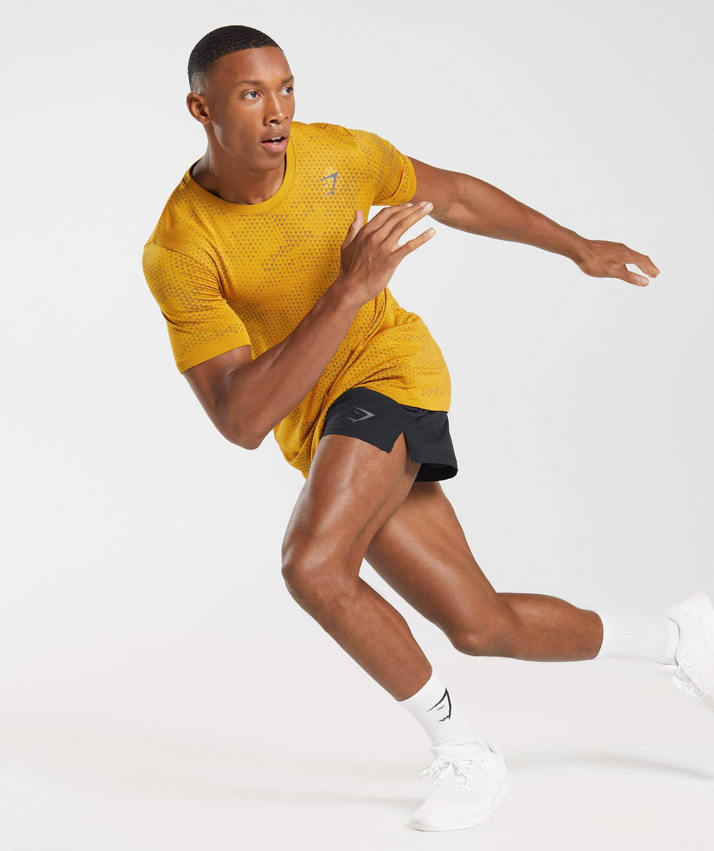 gymshark-sport-seamless-t-shirt-turmeric-yellow-black-aw22