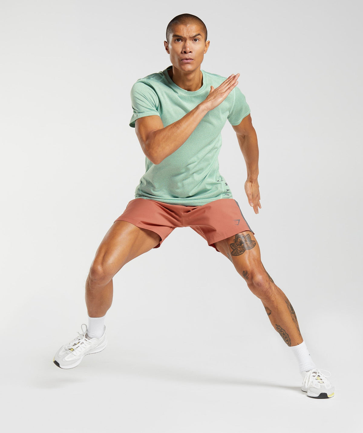 gymshark-sport-shorts-persimmon-red-silhouette-grey-ss23