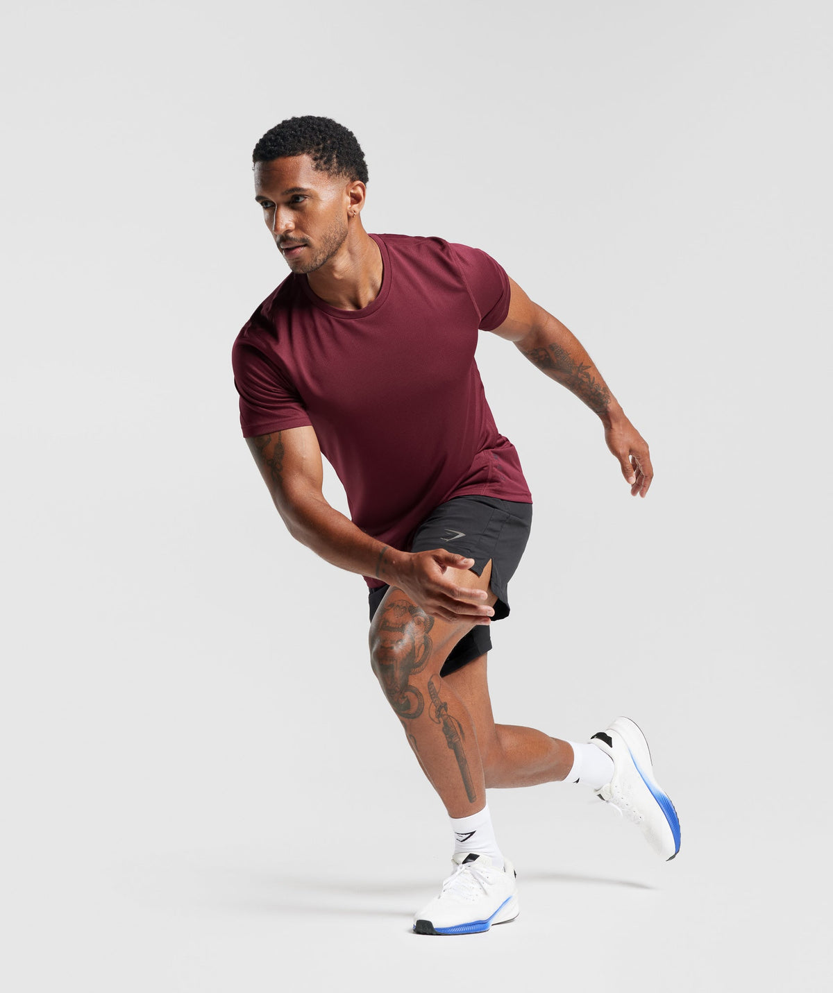 gymshark-sport-t-shirt-plum-pink-black-marl-aw23