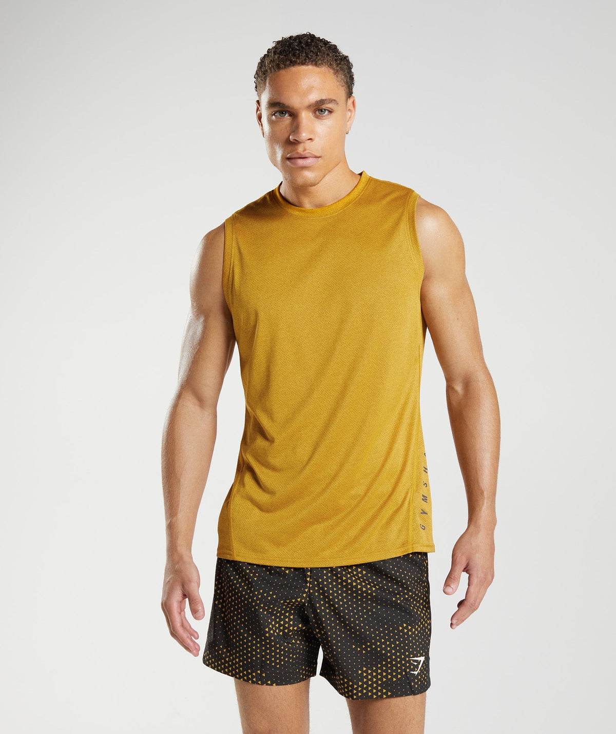 gymshark-sport-tank-turmeric-yellow-black-marl-aw22