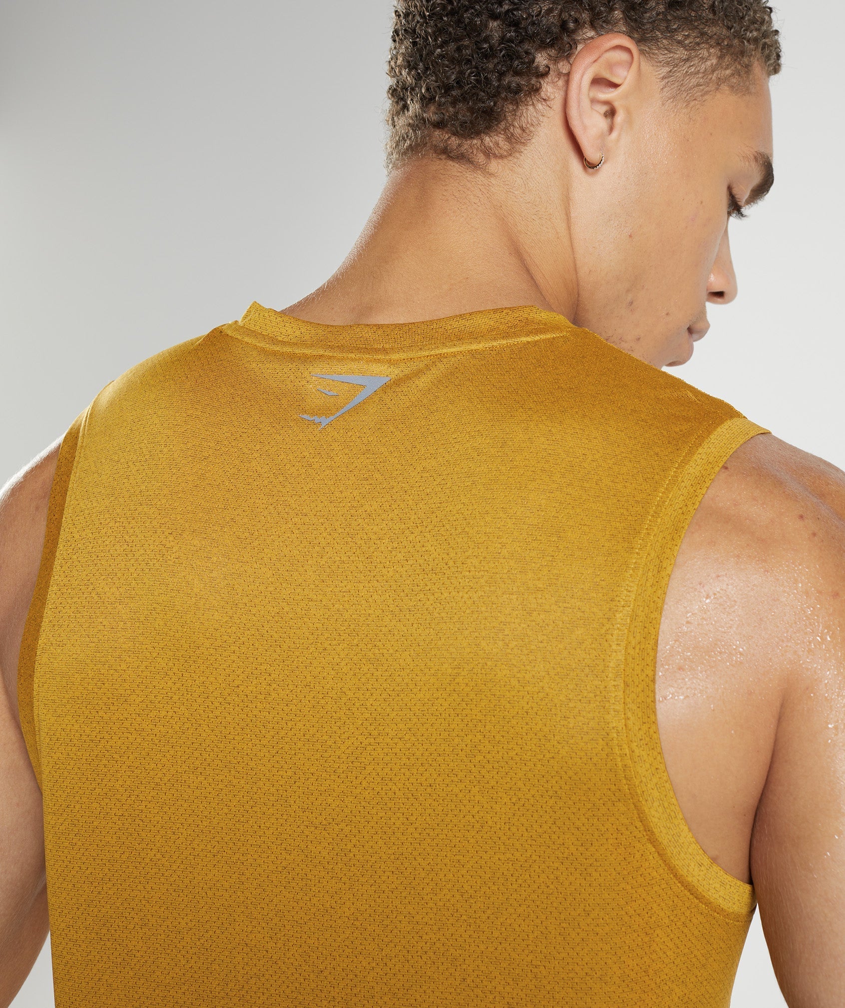 gymshark-sport-tank-turmeric-yellow-black-marl-aw22