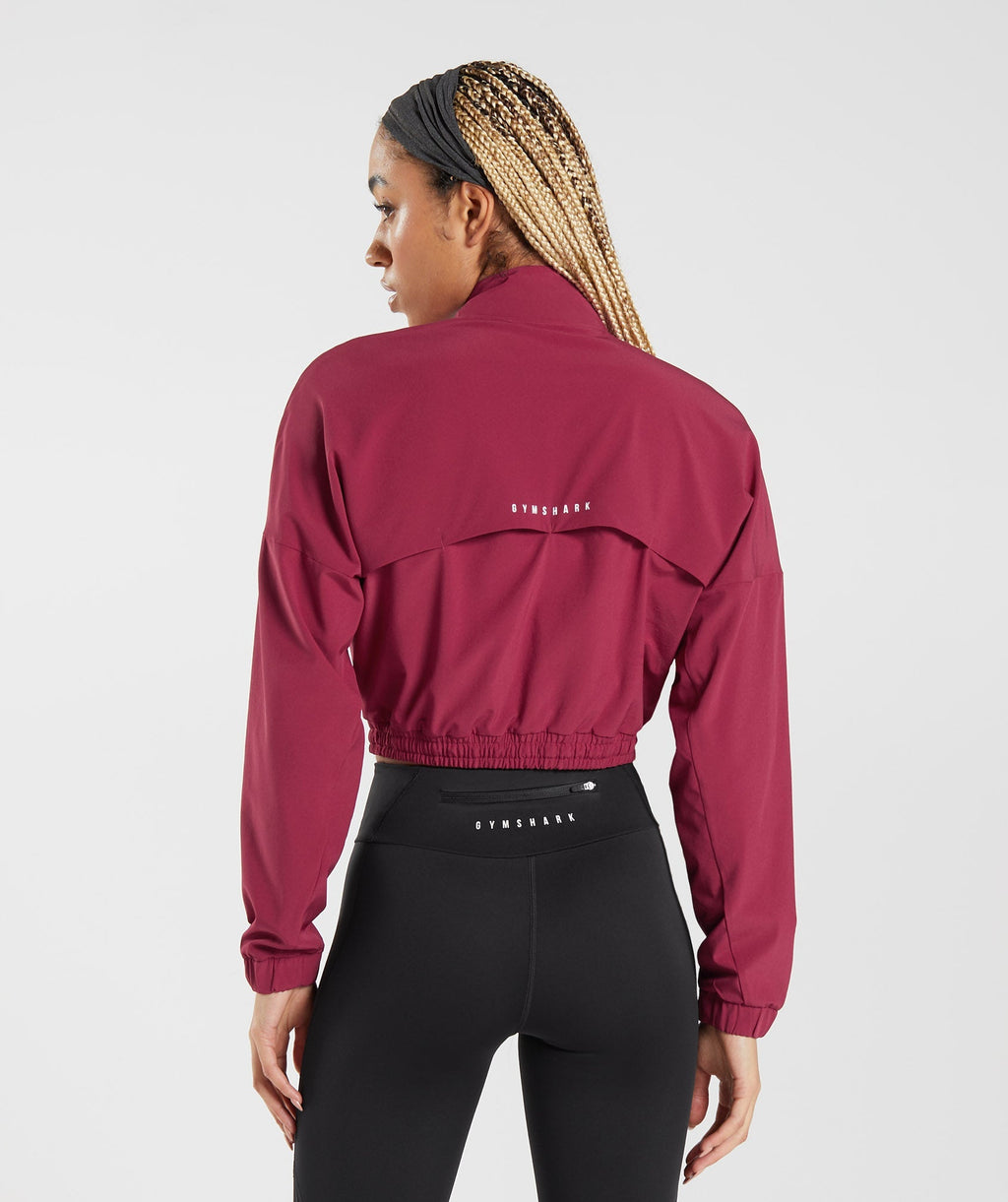 gymshark-sport-windbreaker-currant-pink-aw22