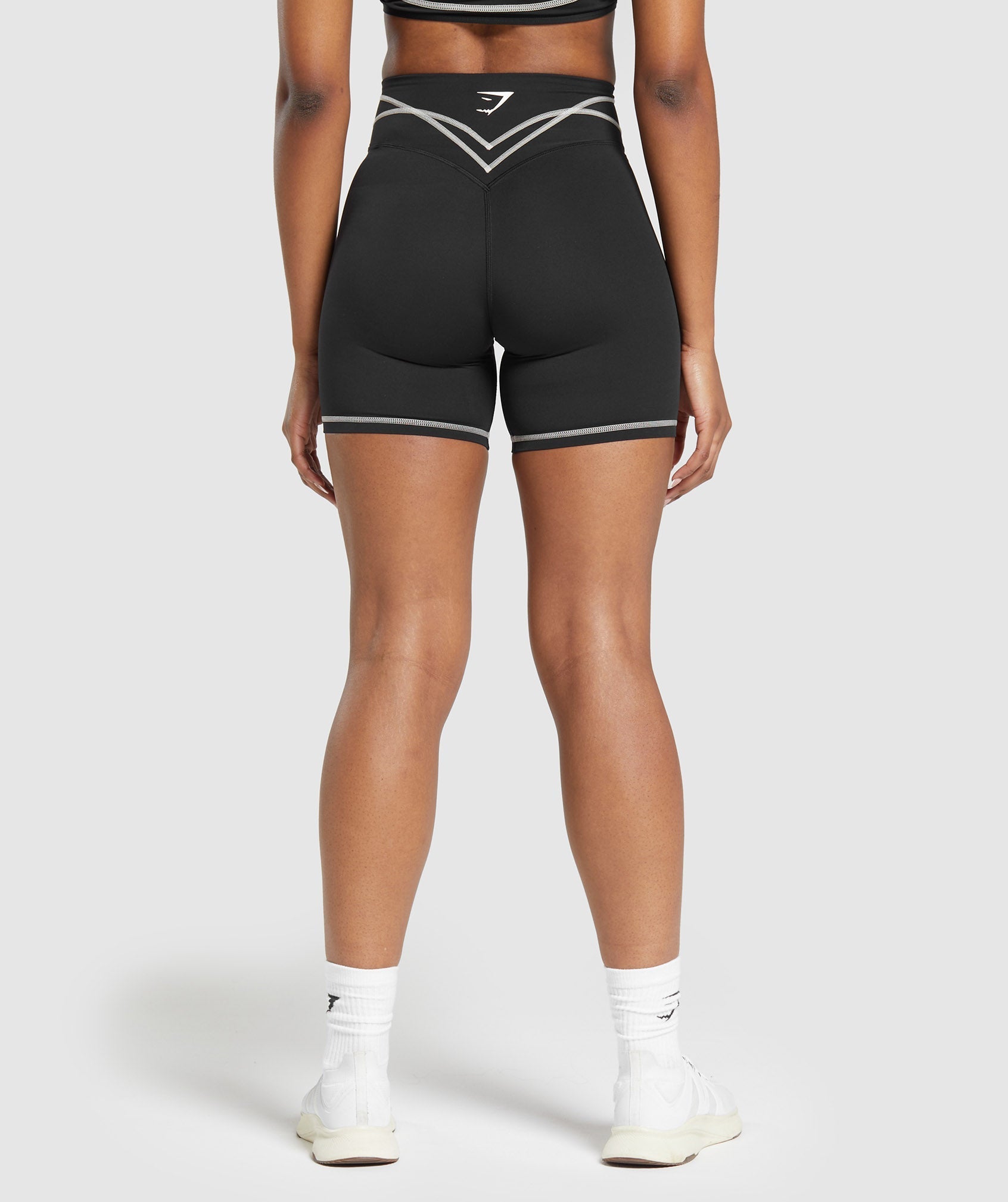 gymshark-stitch-feature-shorts-black-ss24