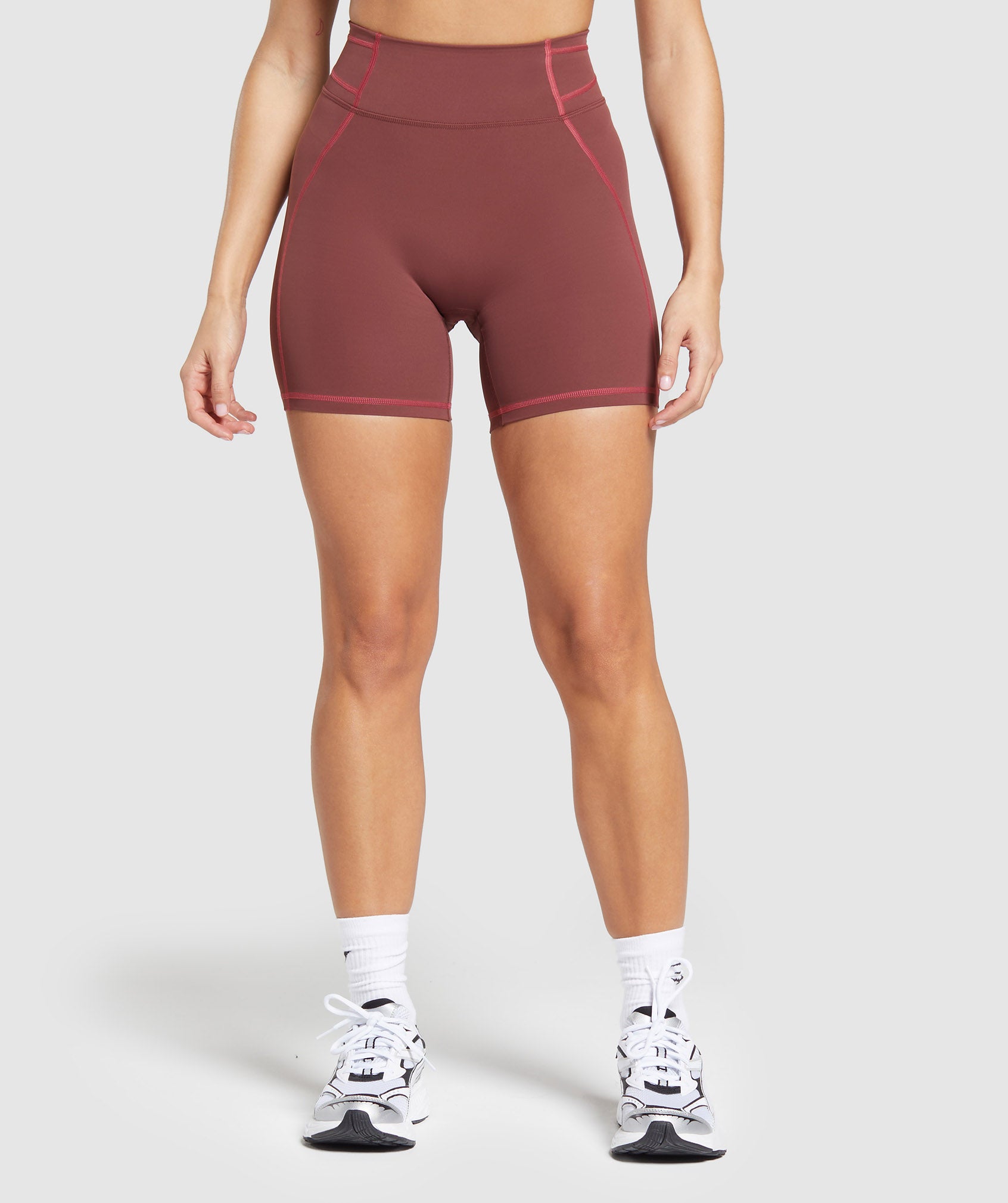 gymshark-stitch-feature-shorts-burgundy-brown-ss24
