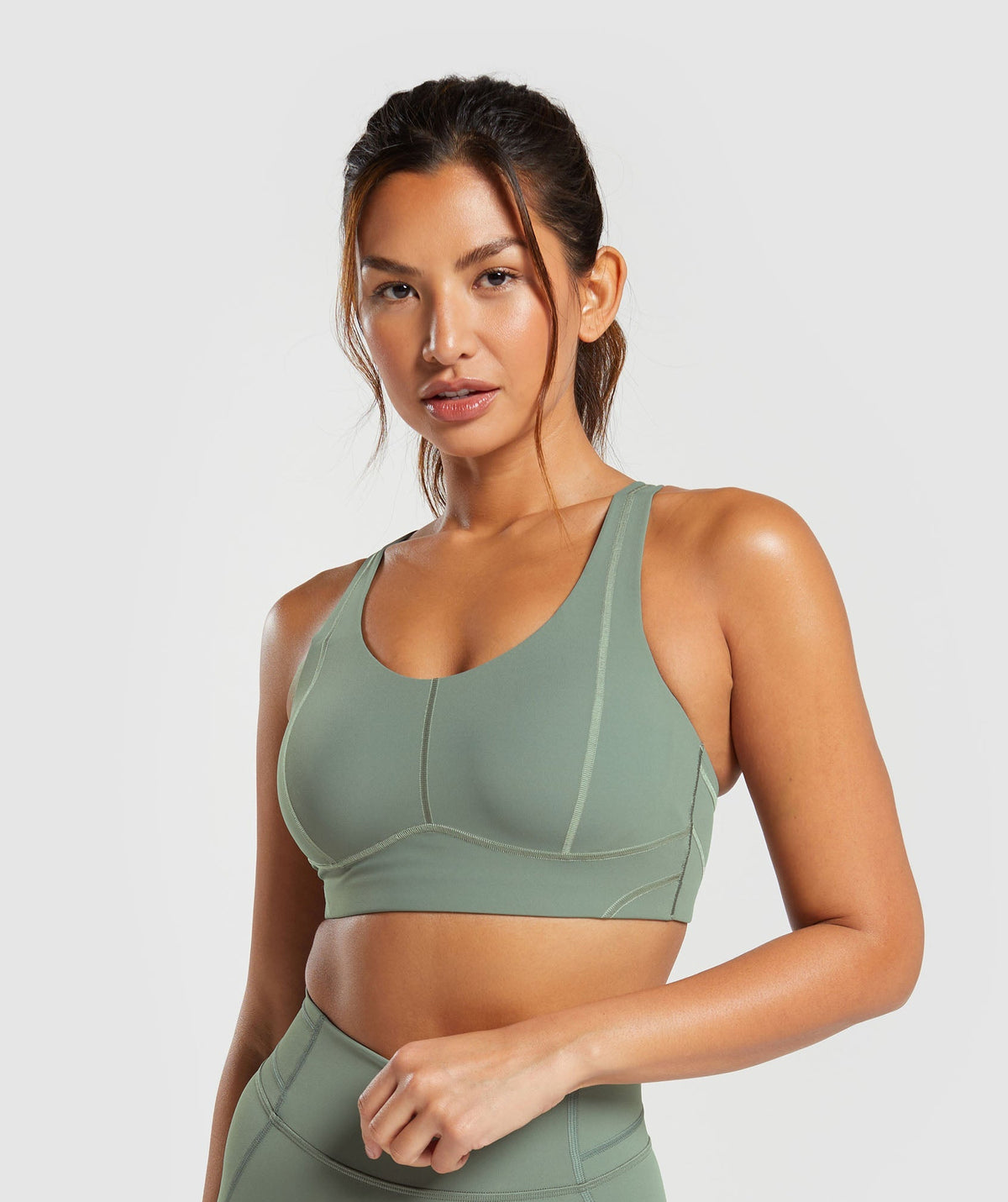 gymshark-stitch-feature-sports-bra-unit-green-ss24