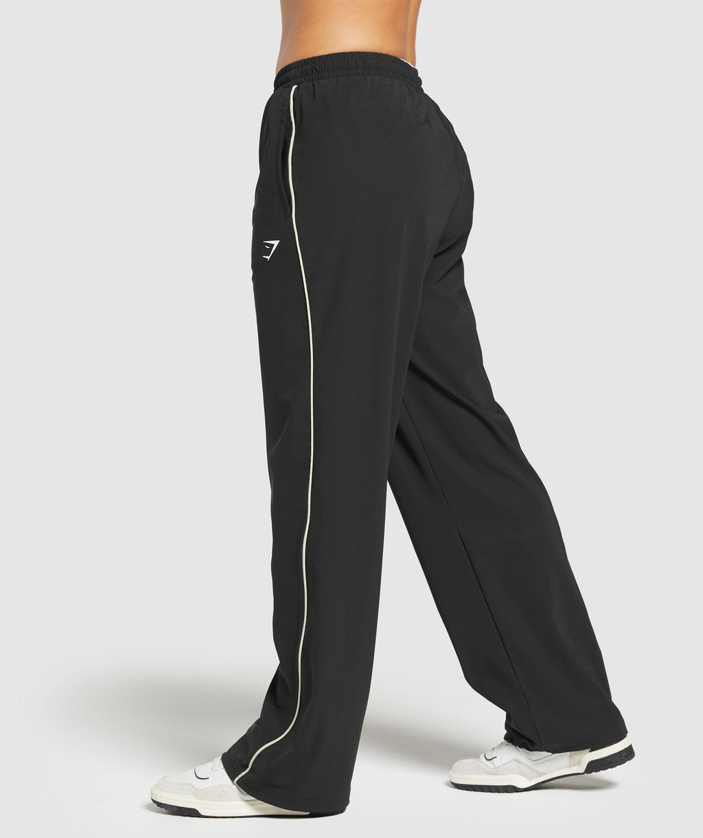 gymshark-stitch-feature-woven-pants-black-ss24