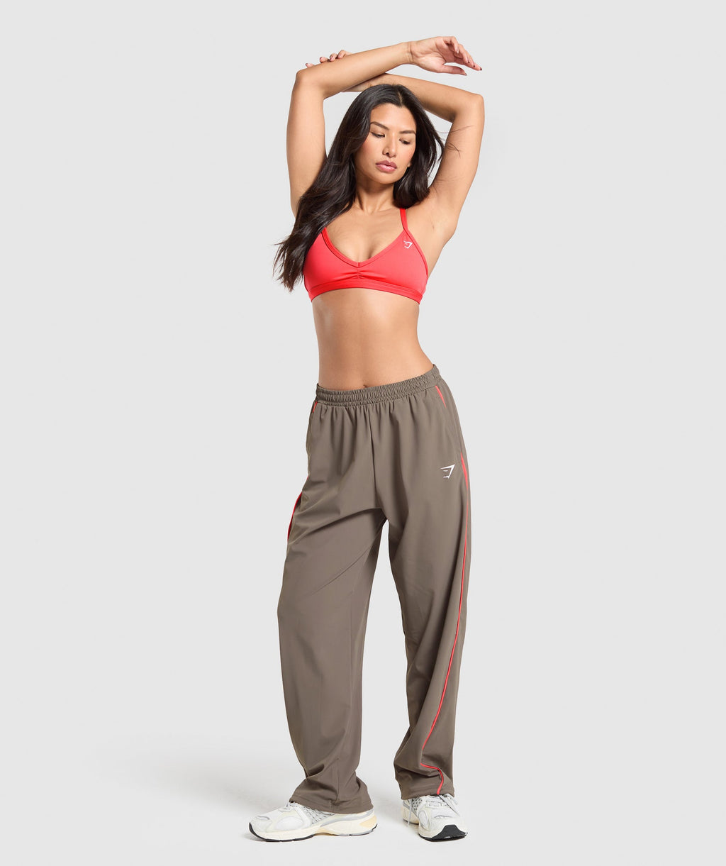 gymshark-stitch-feature-woven-pants-camo-brown-ss25