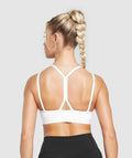 gymshark-strap-feature-sports-bra-white-ss24