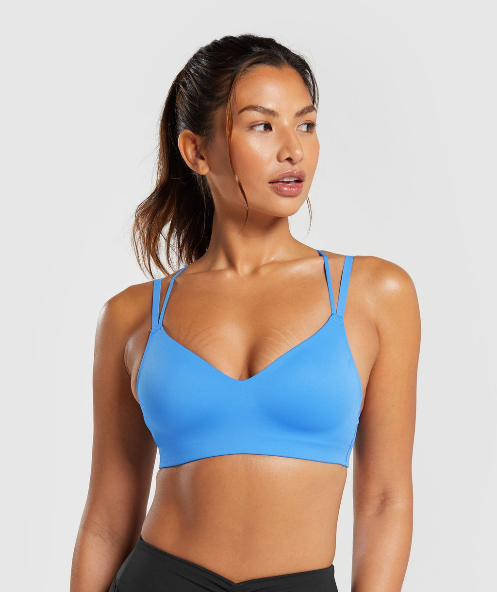 gymshark-strappy-back-light-support-sports-bra-lats-blue-ss24