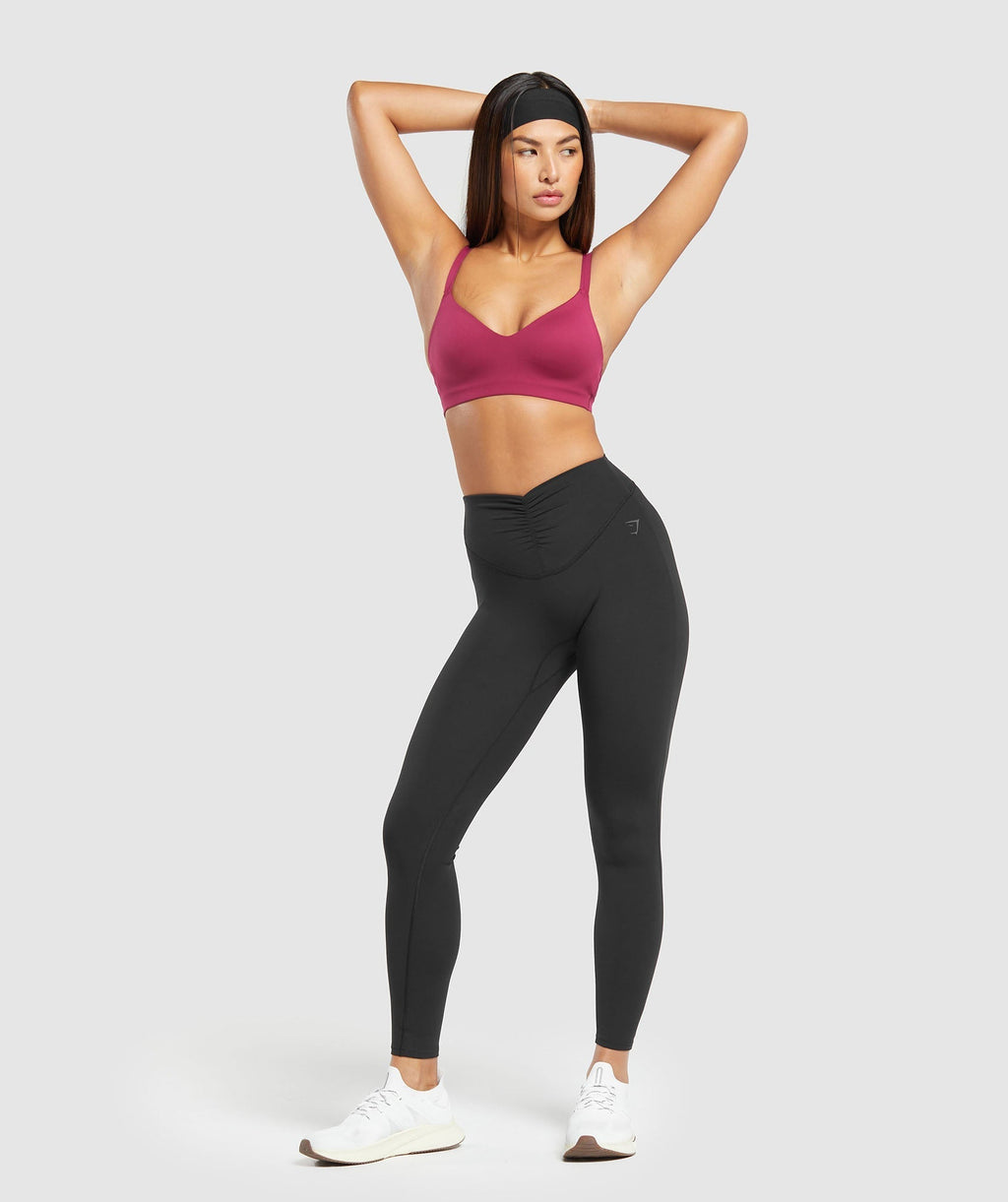 gymshark-strappy-back-light-support-sports-bra-raspberry-pink-aw23