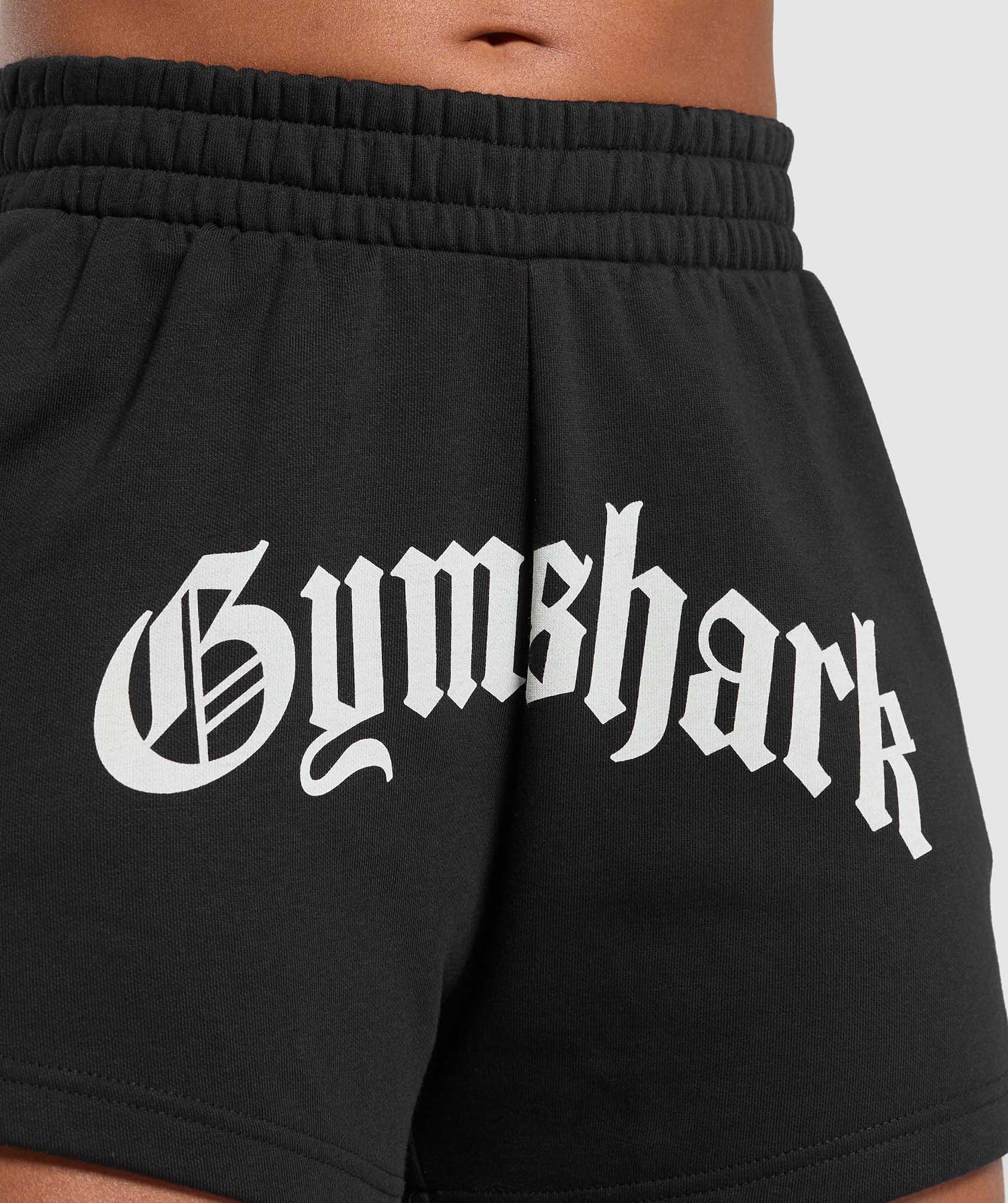gymshark-strength-department-graphic-shorts-black-ss25