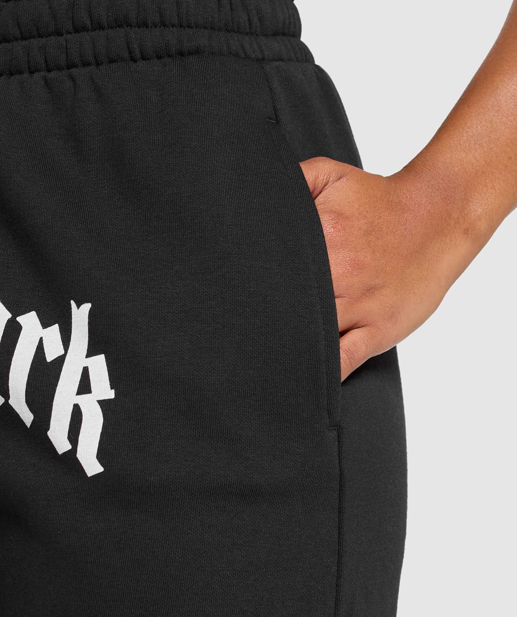 gymshark-strength-department-graphic-shorts-black-ss25