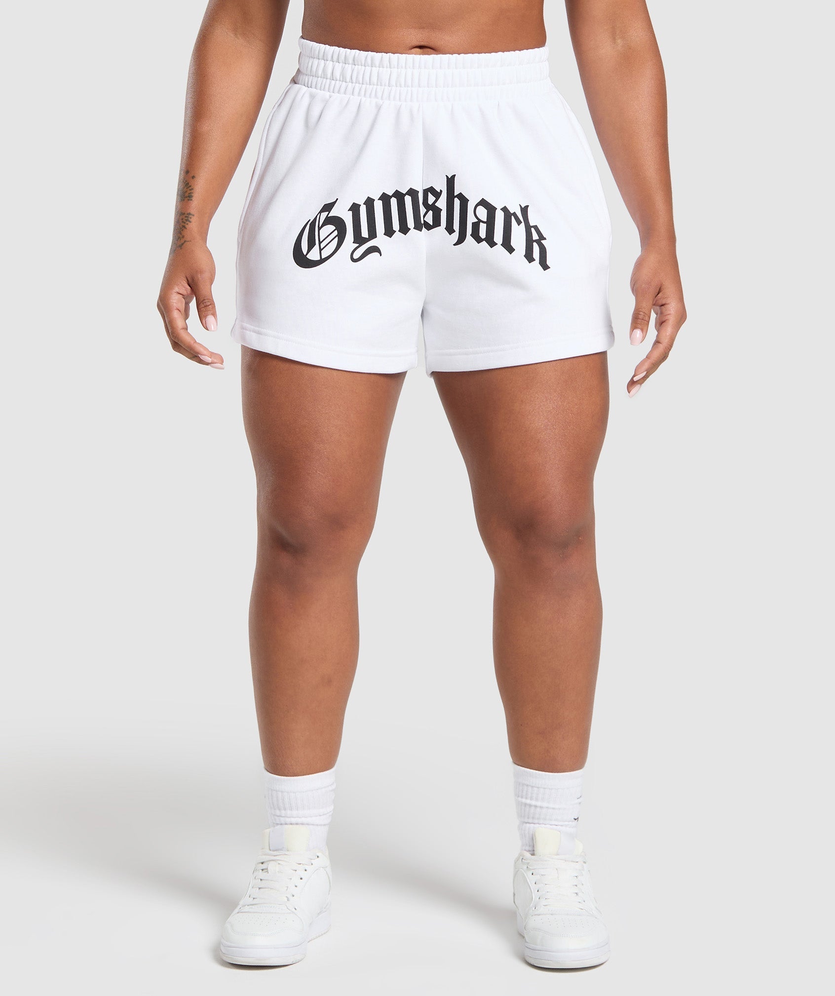 gymshark-strength-department-graphic-shorts-white-ss25