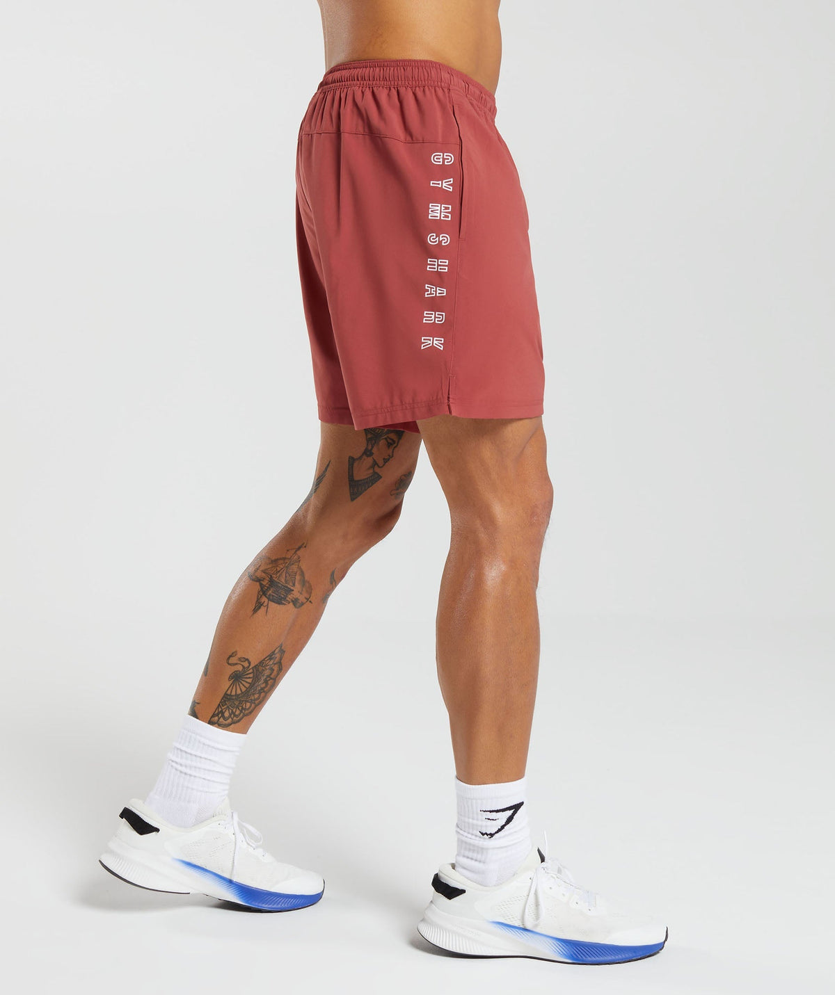 gymshark-strike-shorts-rust-red-aw23