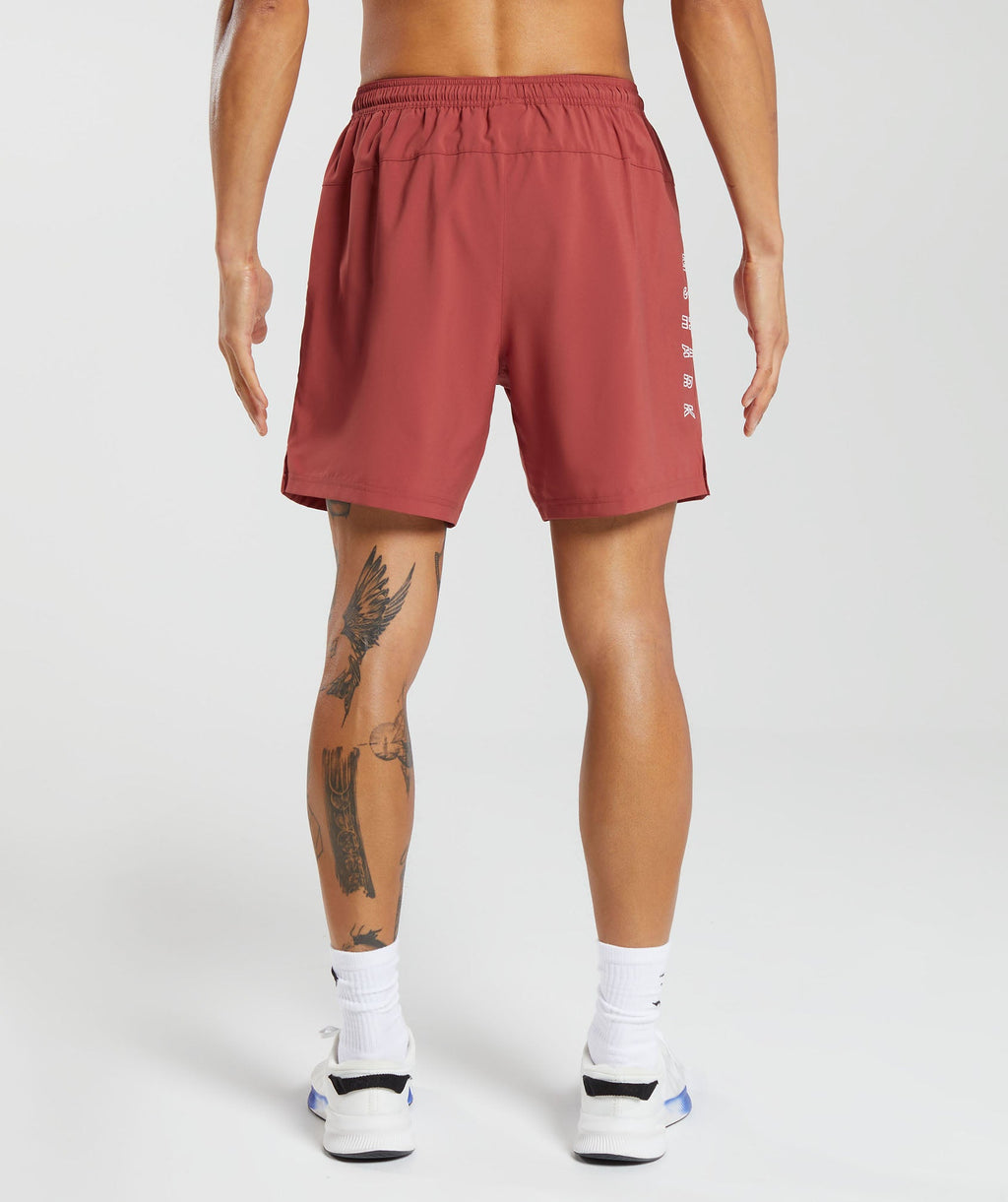 gymshark-strike-shorts-rust-red-aw23