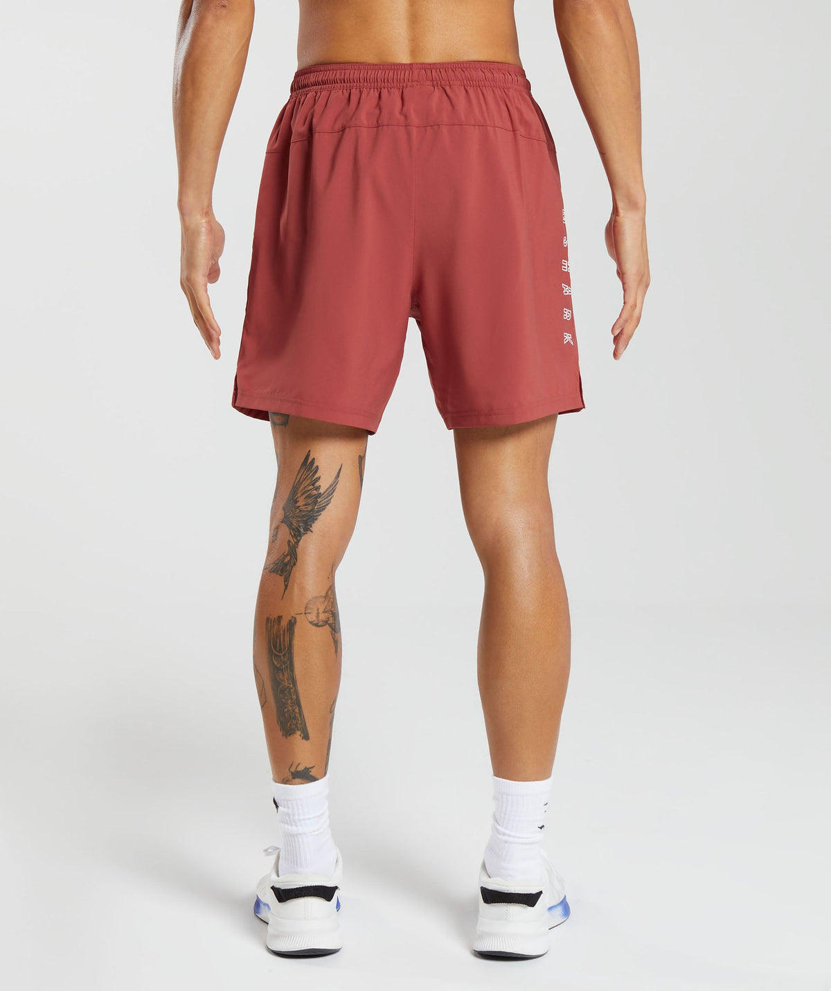 gymshark-strike-shorts-rust-red-aw23