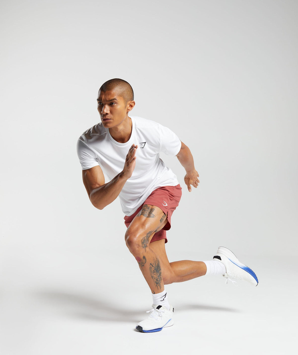 gymshark-strike-shorts-rust-red-aw23
