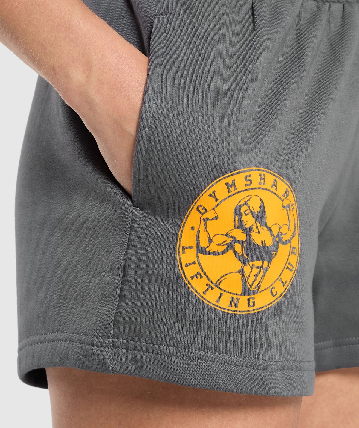 gymshark-strong-girl-lifting-club-graphic-shorts-pitch-grey-aw24