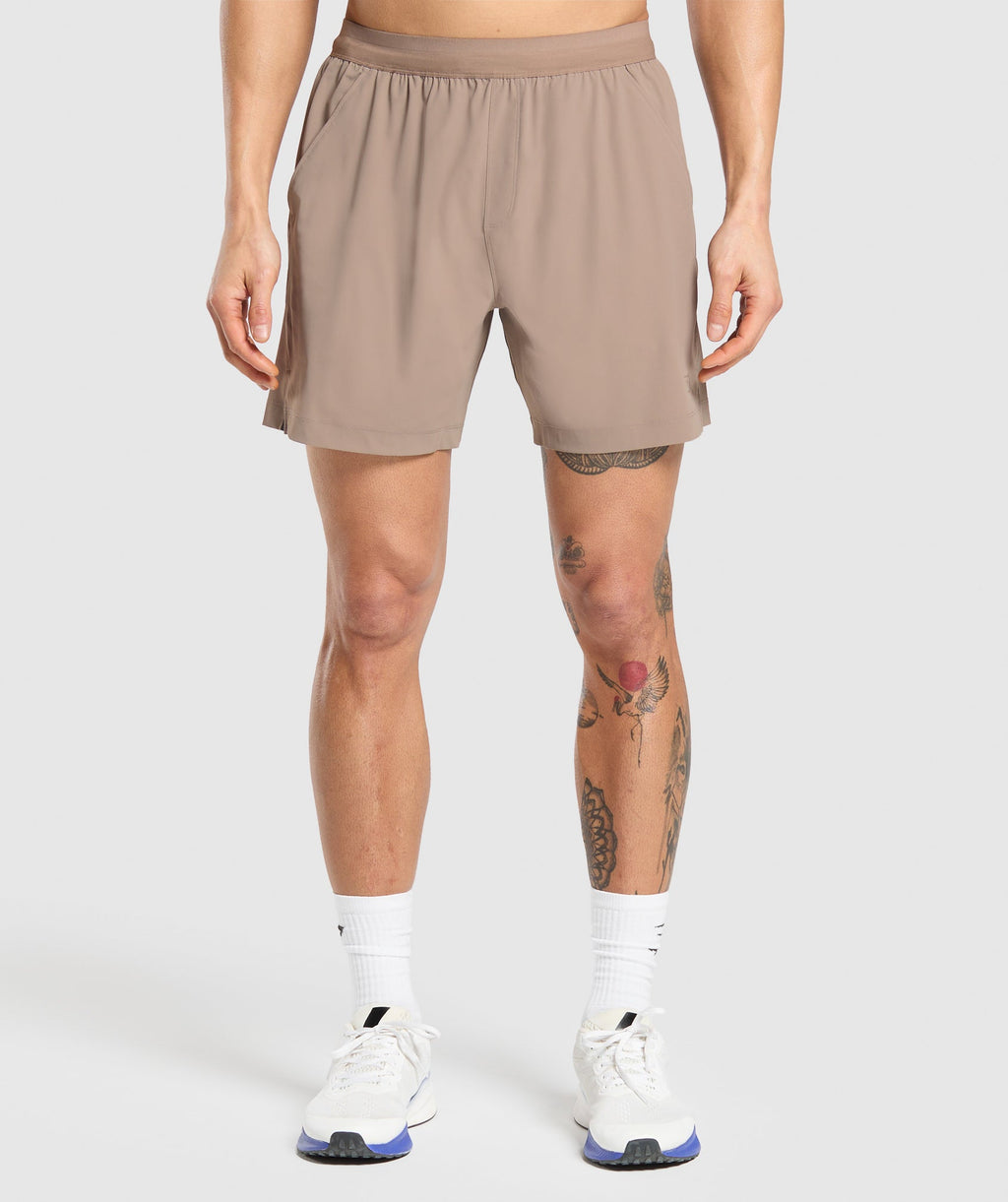 gymshark-hybrid-6-shorts-lifestyle-brown-ss25