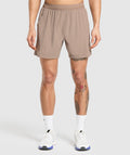 gymshark-hybrid-6-shorts-lifestyle-brown-ss25