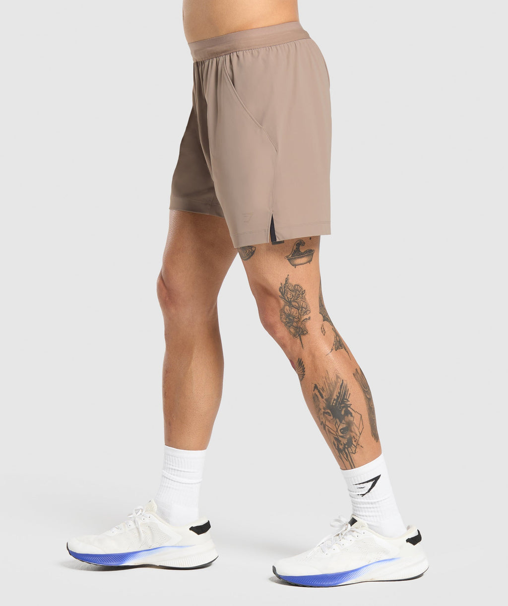 gymshark-hybrid-6-shorts-lifestyle-brown-ss25