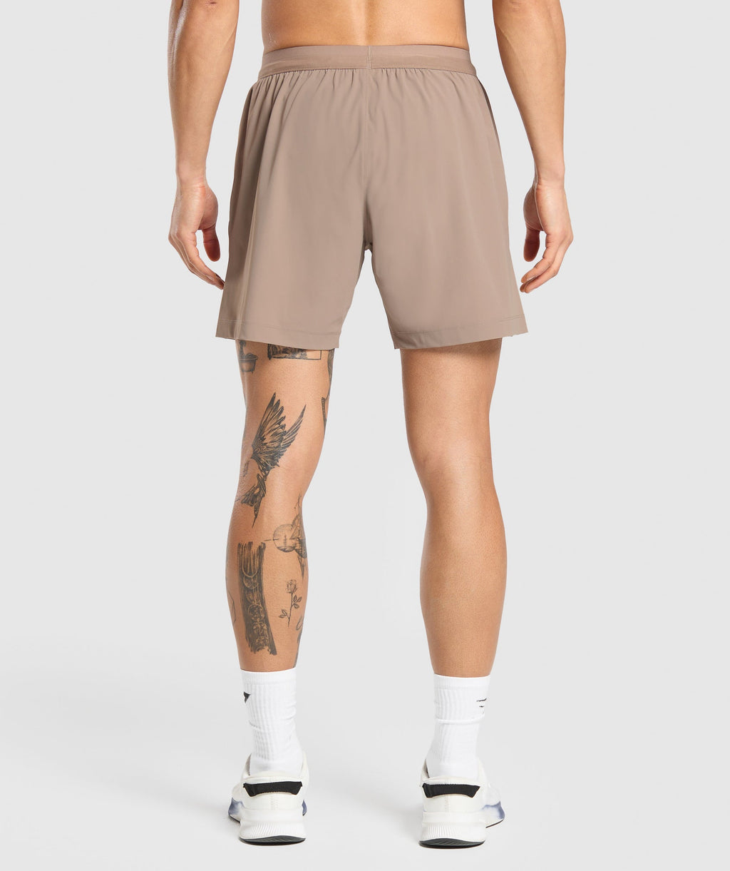 gymshark-hybrid-6-shorts-lifestyle-brown-ss25