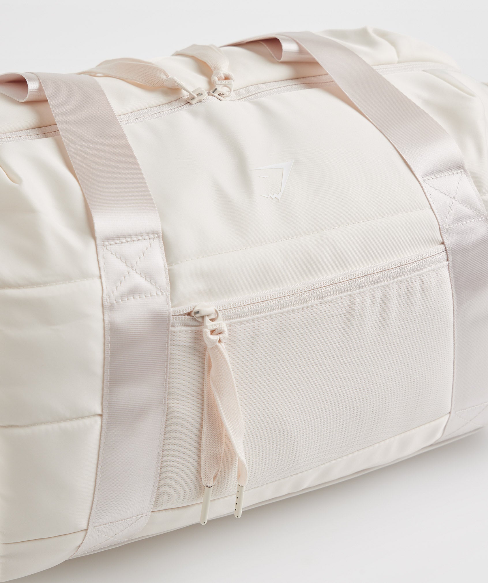 gymshark-studio-holdall-coconut-white-ss22