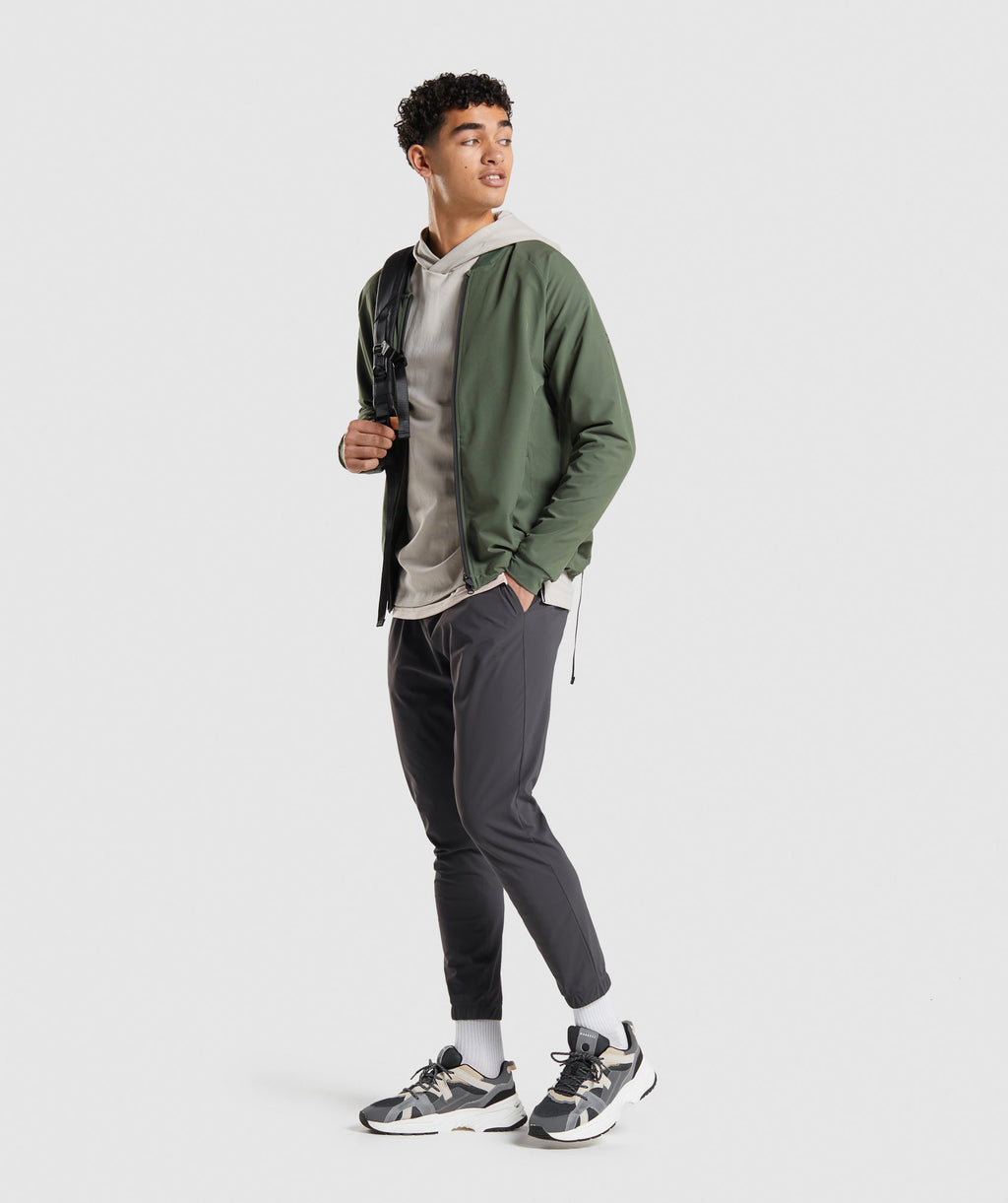 gymshark-studio-jacket-core-olive-ss22