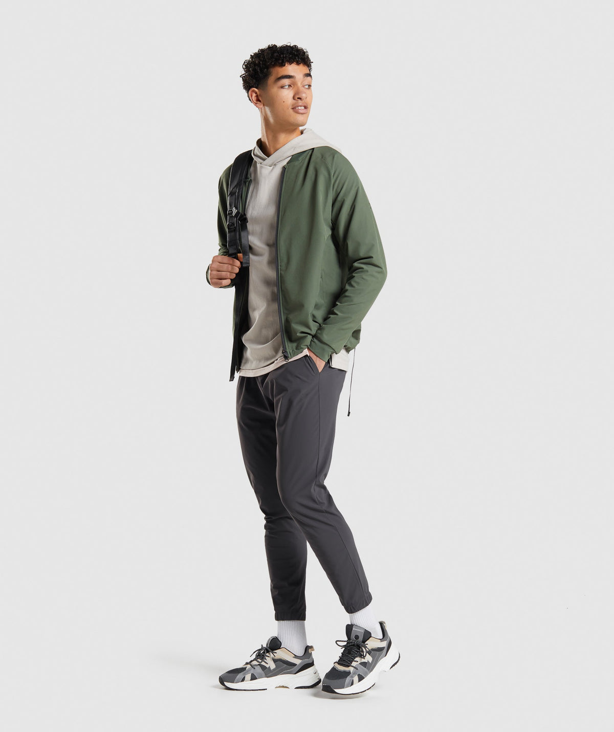 gymshark-studio-jacket-core-olive-ss22