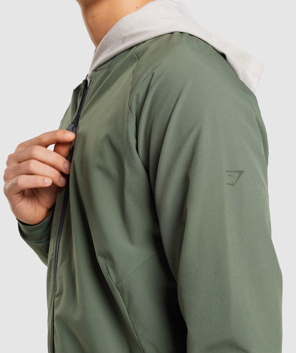 gymshark-studio-jacket-core-olive-ss22