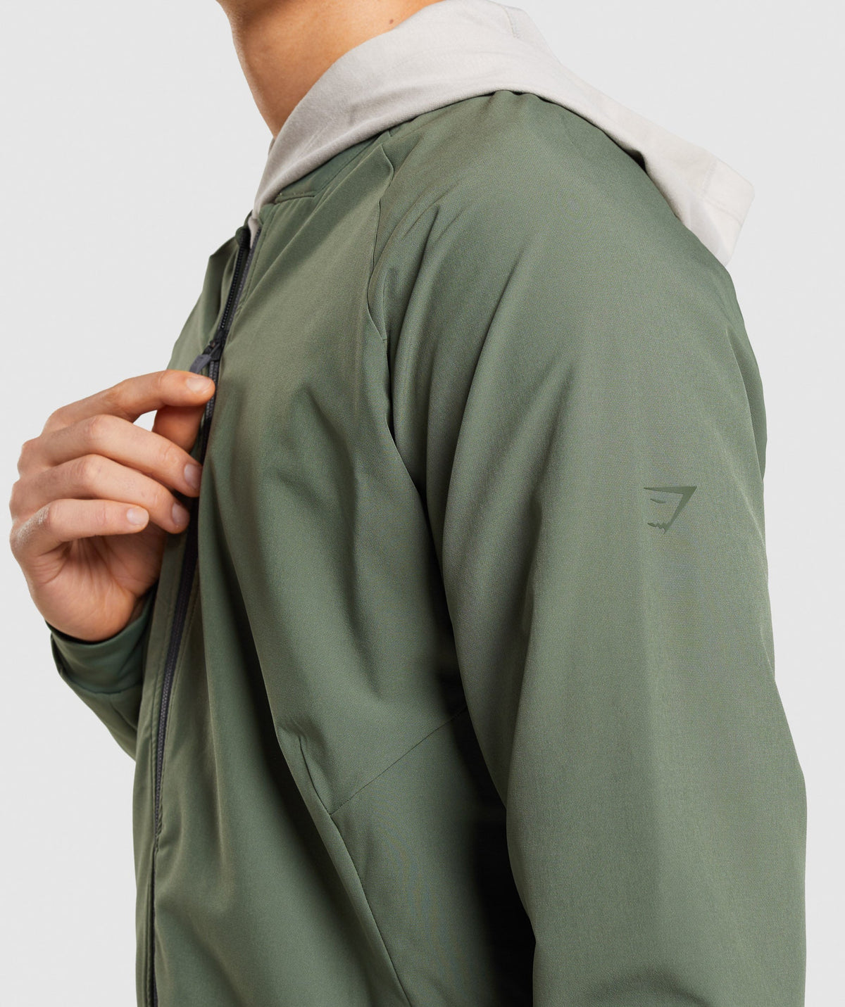 gymshark-studio-jacket-core-olive-ss22