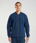 gymshark-studio-jacket-navy-aw22