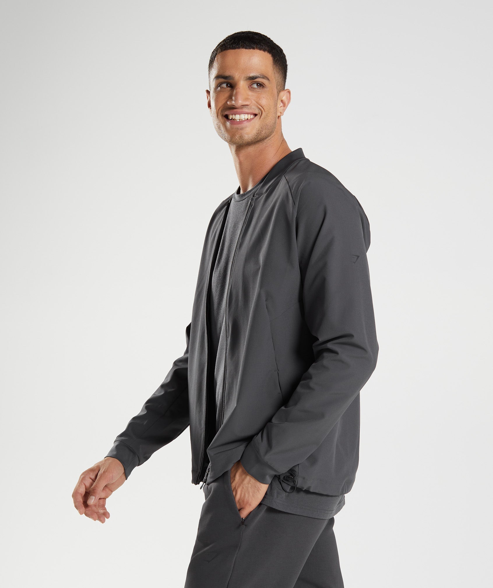 gymshark-studio-jacket-onyx-grey-aw22
