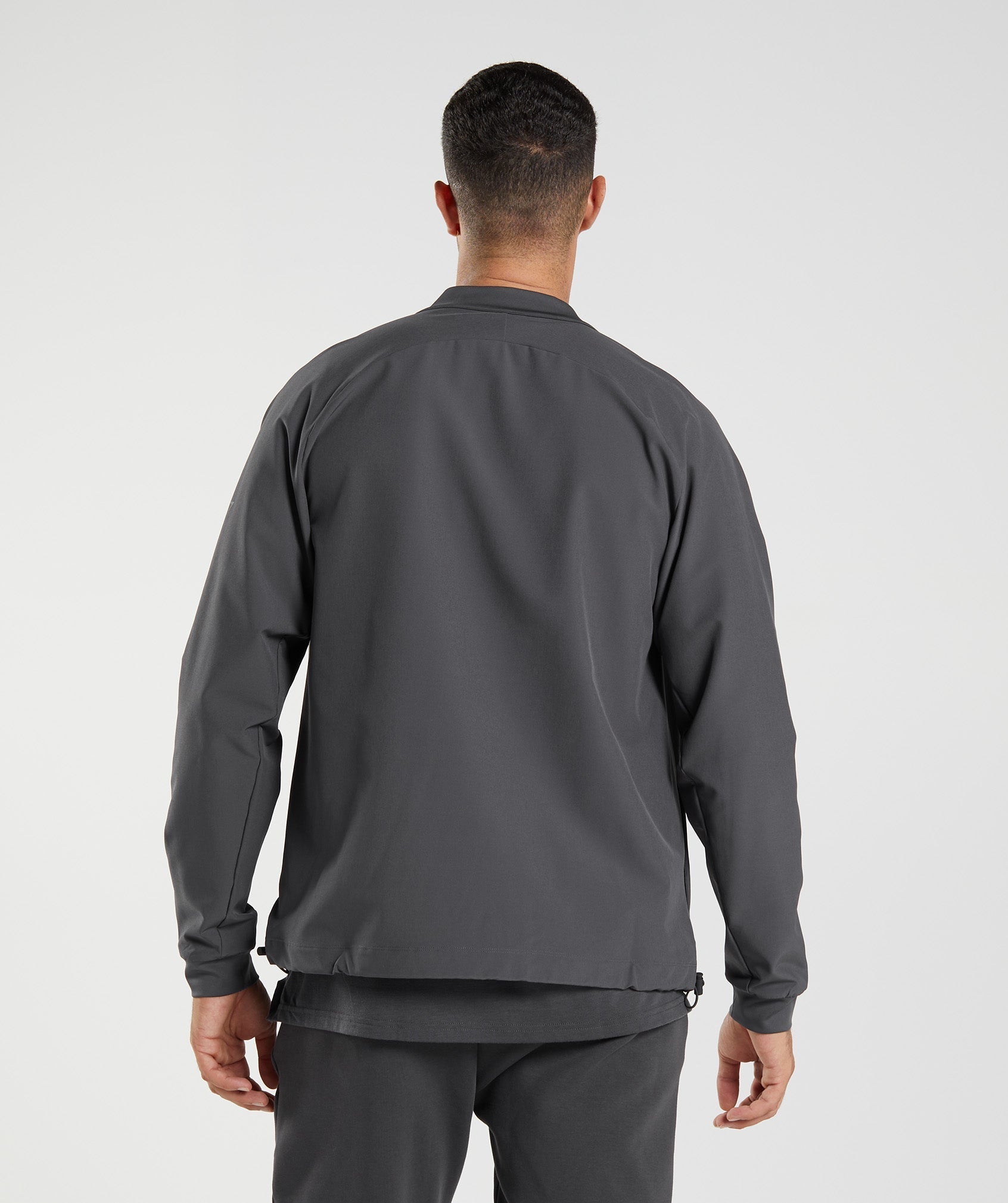 gymshark-studio-jacket-onyx-grey-aw22