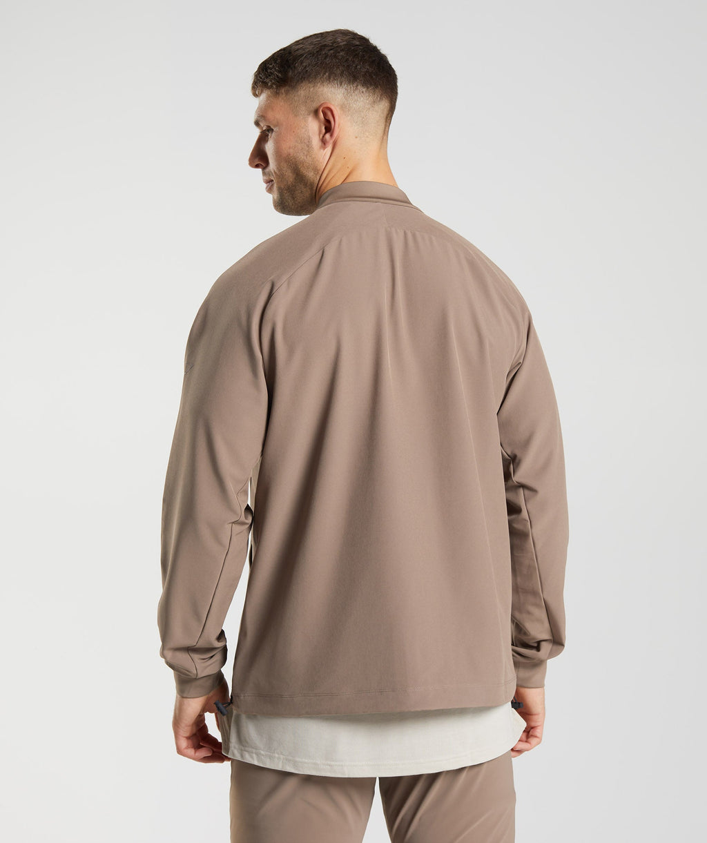 gymshark-studio-jacket-soul-brown-aw22