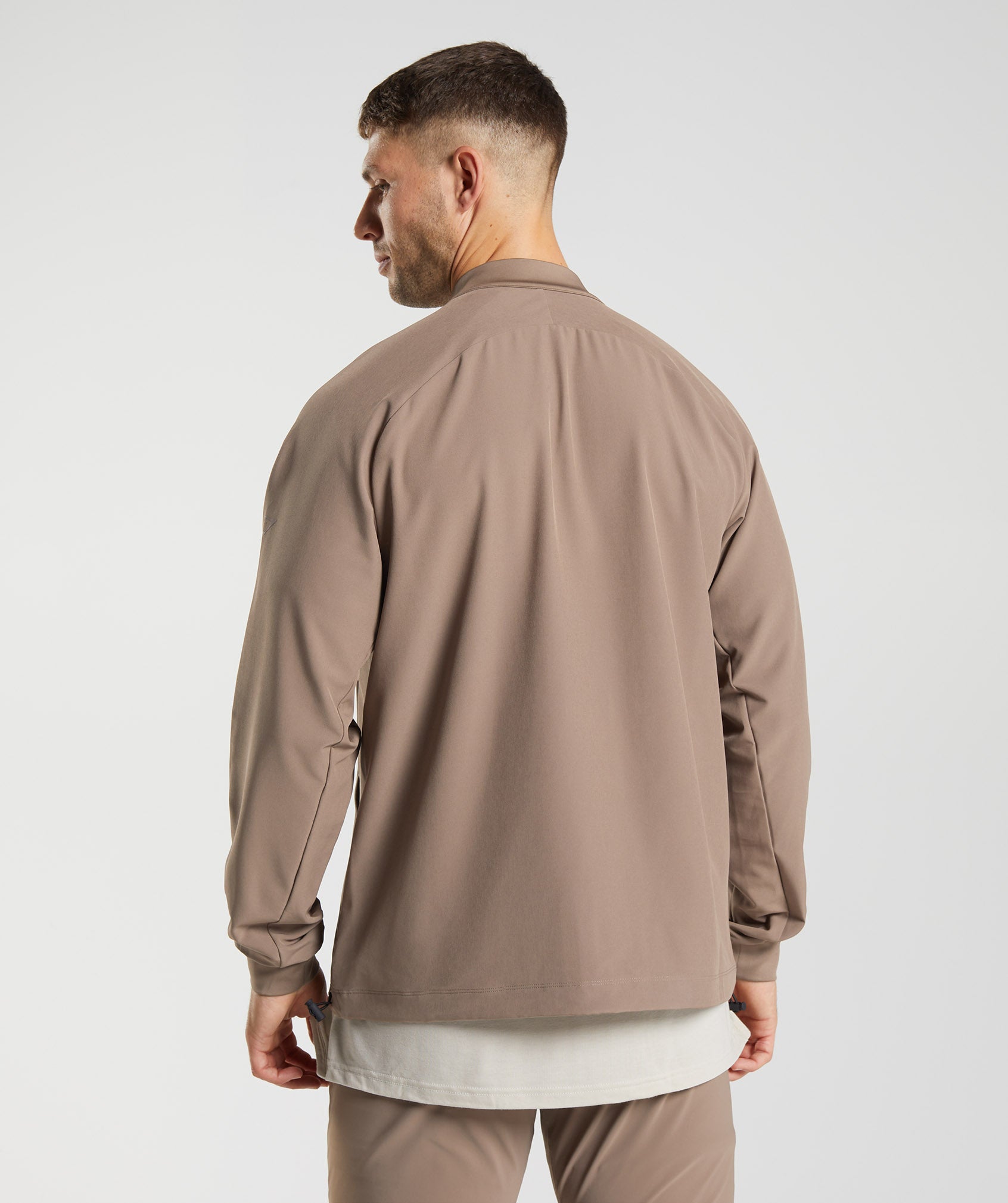 gymshark-studio-jacket-soul-brown-aw22