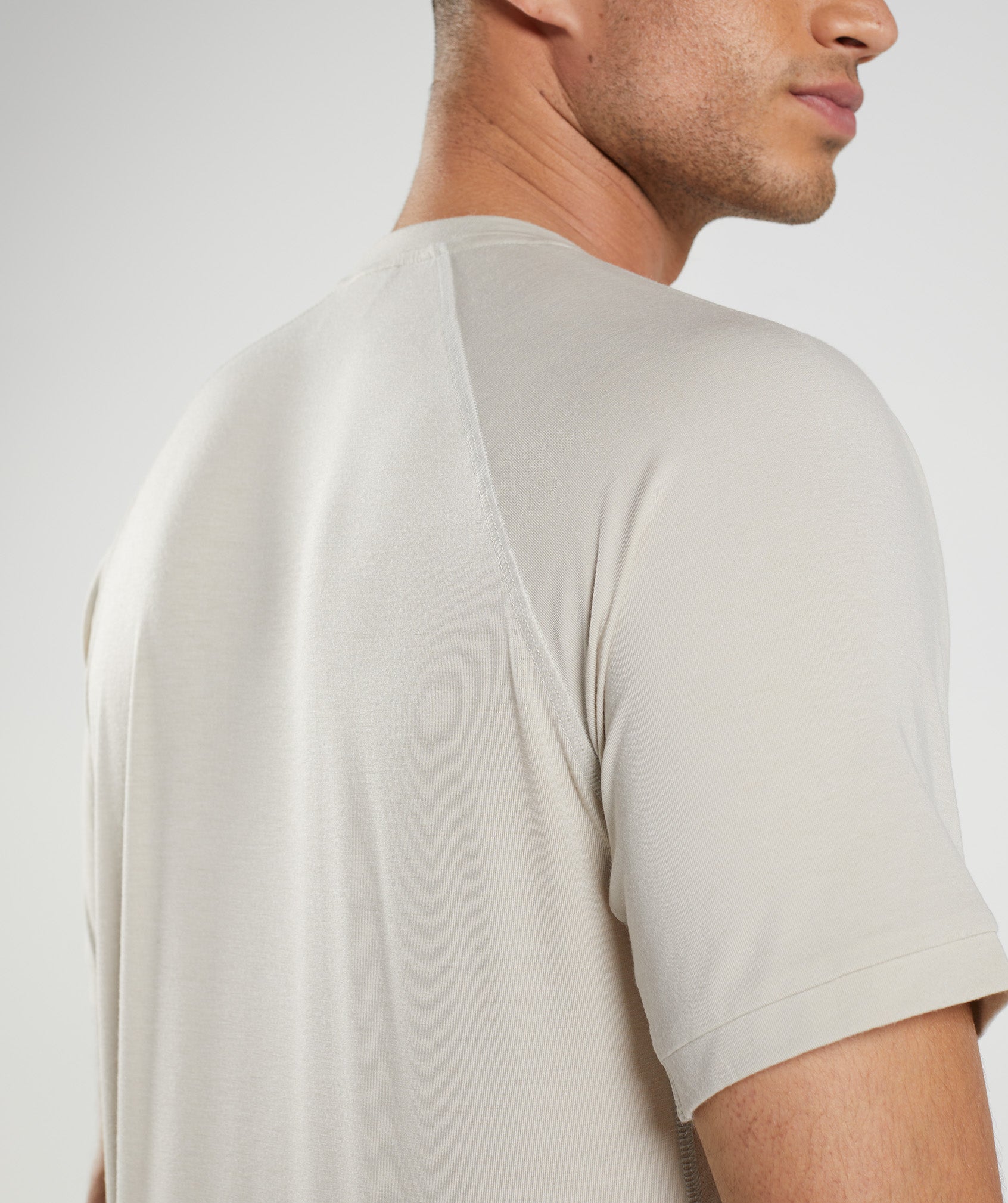 gymshark-studio-t-shirt-pebble-grey-aw22