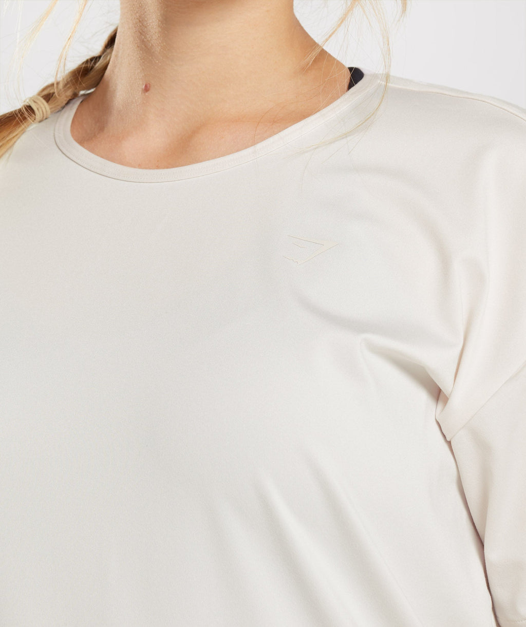 gymshark-studio-t-shirt-coconut-white-ss22