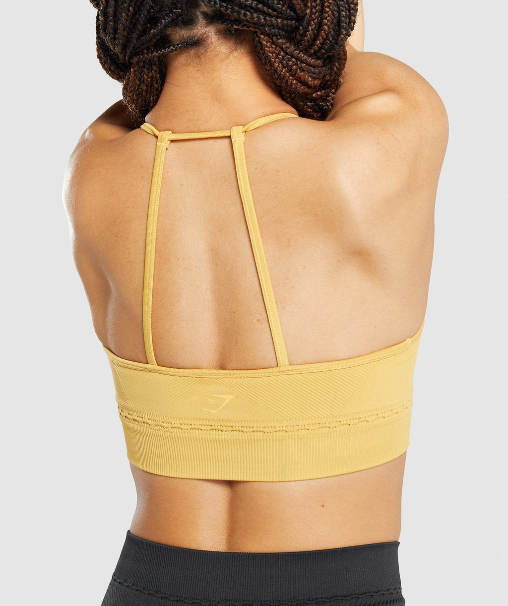 gymshark-studio-seamless-sports-bra-yellow-aw21