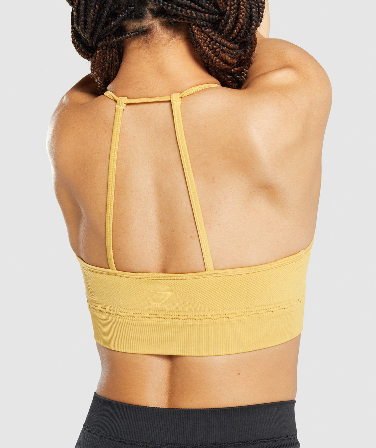 gymshark-studio-seamless-sports-bra-yellow-aw21
