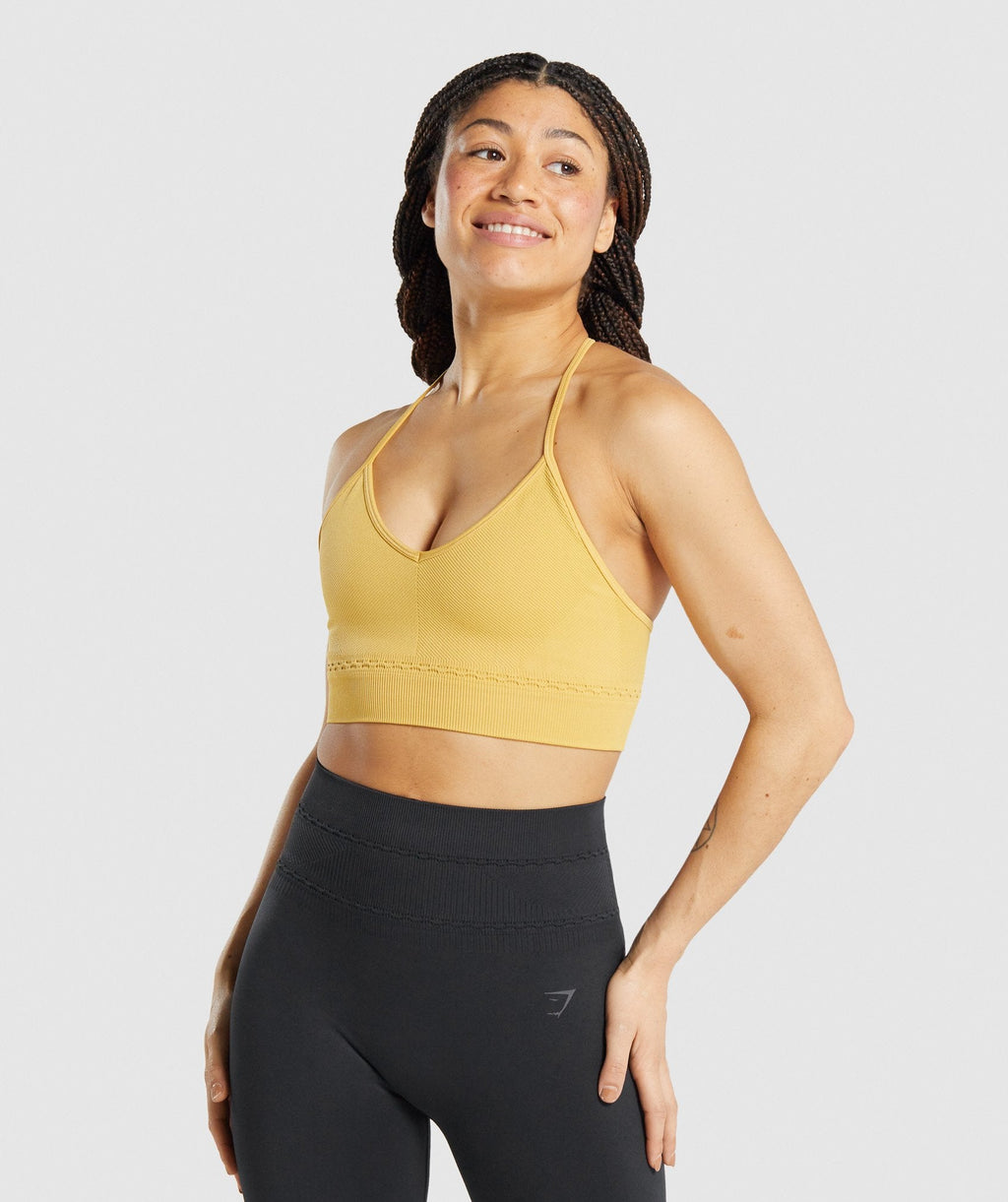 gymshark-studio-seamless-sports-bra-yellow-aw21