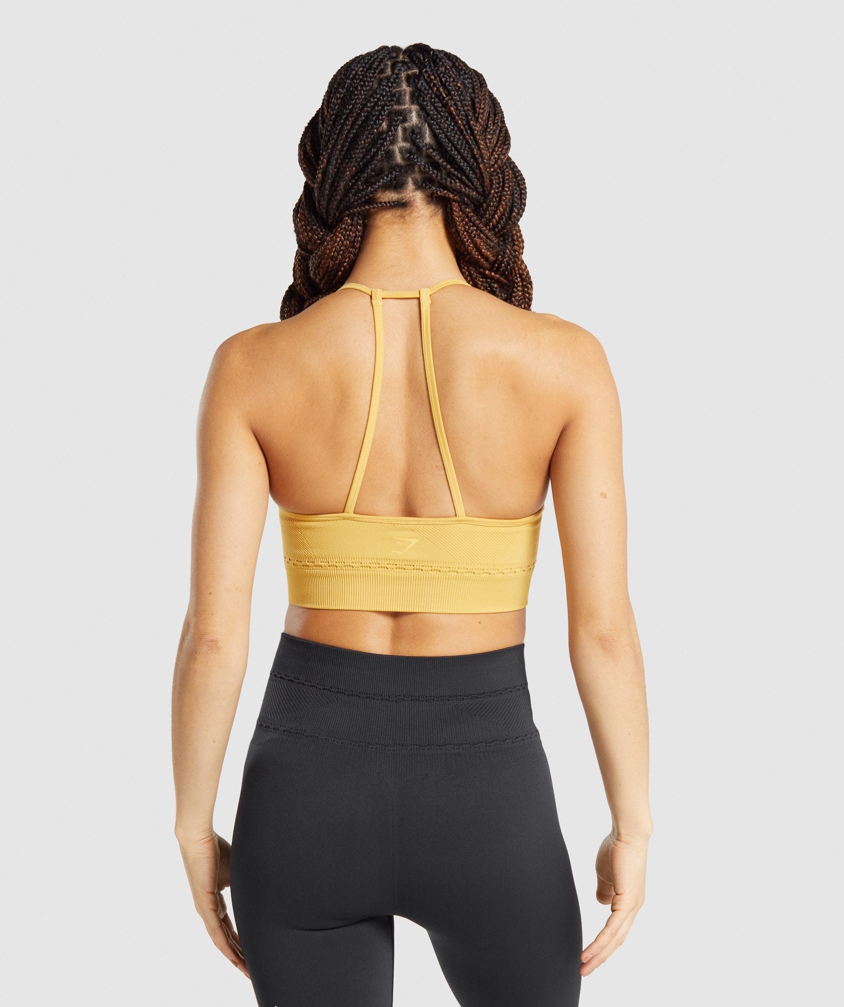 gymshark-studio-seamless-sports-bra-yellow-aw21