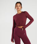gymshark-sweat-seamless-long-sleeve-crop-top-plum-pink-aw23