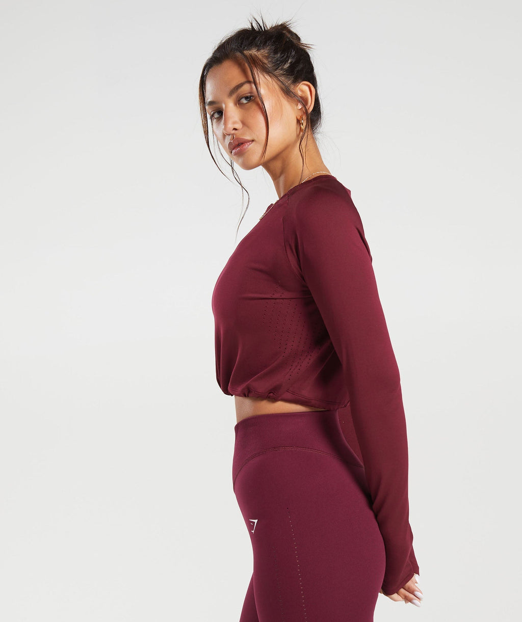 gymshark-sweat-seamless-long-sleeve-crop-top-plum-pink-aw23