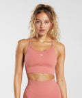 gymshark-sweat-seamless-longline-sports-bra-terracotta-pink-ss23