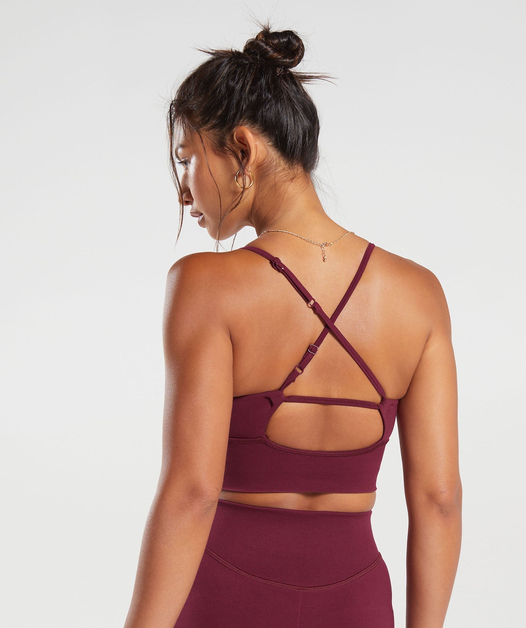 gymshark-sweat-seamless-longline-sports-bra-plum-pink-aw23