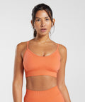 gymshark-sweat-seamless-sports-bra-aerospace-orange-ss23