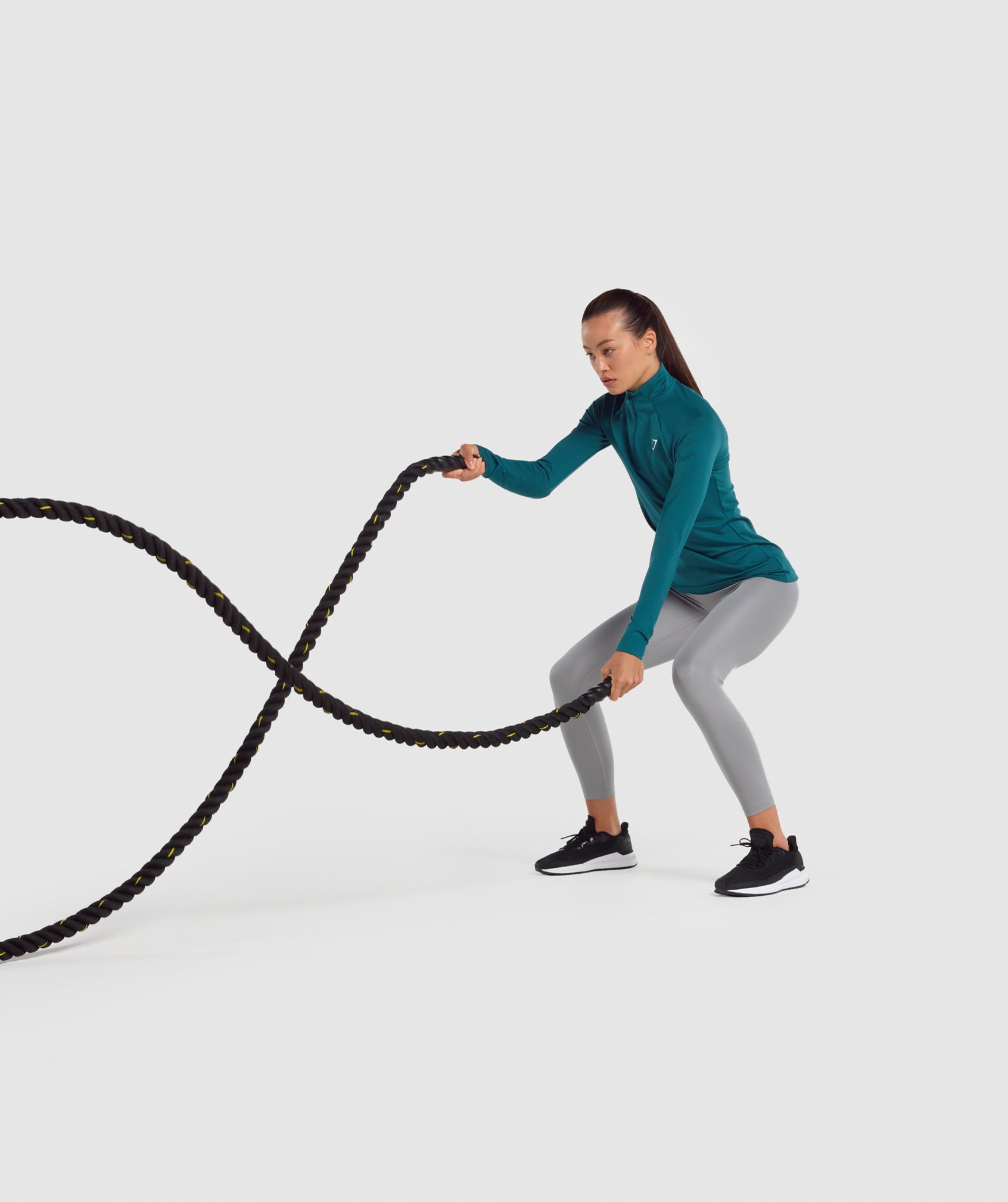 gymshark-training-1-4-zip-niagara-teal