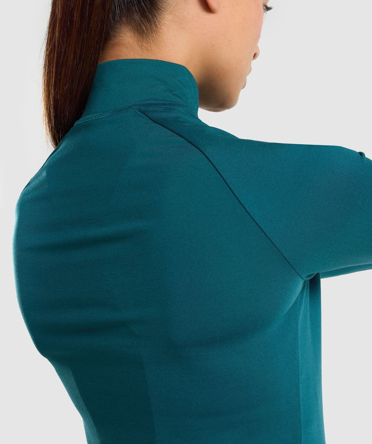 gymshark-training-1-4-zip-niagara-teal